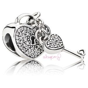 EUC Pandora 791429CZ Sterling Silver Lock of Love Heart Dangle Charm w/ CZ’s
